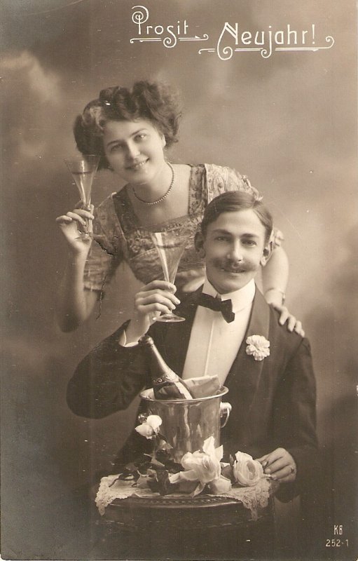 Couple Toasting. Prosit Neujahr!  Nice old vintage German postcard