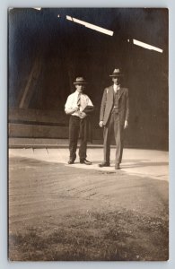 RPPC Two Men in Hats Standing Under Structure AZO 1918-1930 VTG Postcard 1362