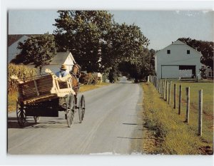 Postcard A local furniture maker delivers a piece of work, Amish Seasons, PA