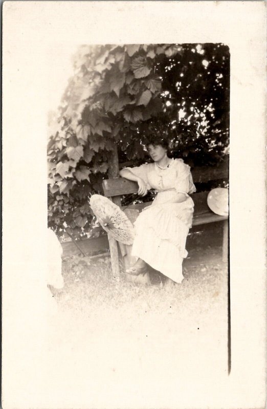 Edwardian Woman Umbrella On Bench in Shade RPPC Postcard B21