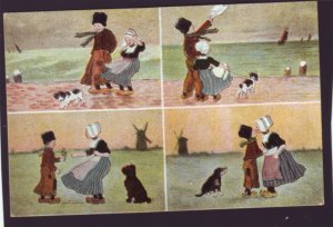 P1360 vintage unused postcard multi view dutch boy girl dog the kiss