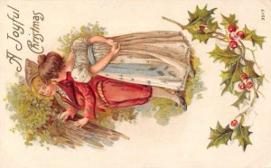 Christmas Greetings Romance Boy Carving Hearts in Tree Vintage Postcard AA15941