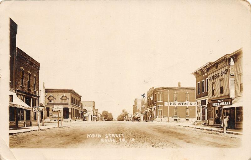 F35/ Rolfe Iowa RPPC Postcard 1914 Main Street Harness Shop Bank