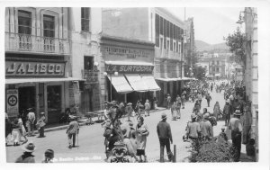 H71/ Foreign Postcard Juarez Mexico RPPC c40s Benito St Crowd Stores 103