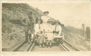 1914 People Railroad track hand colored RPPC Photo Postcard 1939 