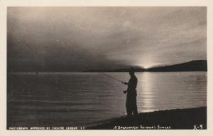 RPPC A Sourdough Soldier's Sunset - Fishing in Alaska