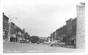 Postcard RPPC Iowa Lewiston Main Street 1940s automobiles 23-1351