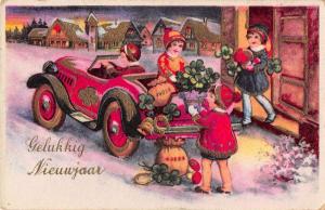 Dutch Happy New Year children unloading car snow scene antique pc Y13117