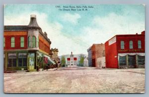 IDAHO FALLS ID STREET SCENE ON OREGON SHORT LINE RAILROAD ANTIQUE POSTCARD 