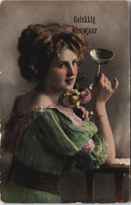 Happy New Year Woman with a Glass and Flowers Vintage Postcard C220