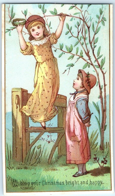 c1880s Christmas Trade Card Cute Girls Play Tree Birds Nest Victorian Vtg C35