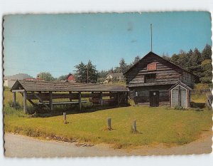 Postcard Alexander Blockhouse and American Indian dug-out canoes, Coupeville, WA