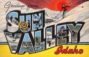 Sun Valley Idaho Greetings From skier on slope large letter antique pc Z49816