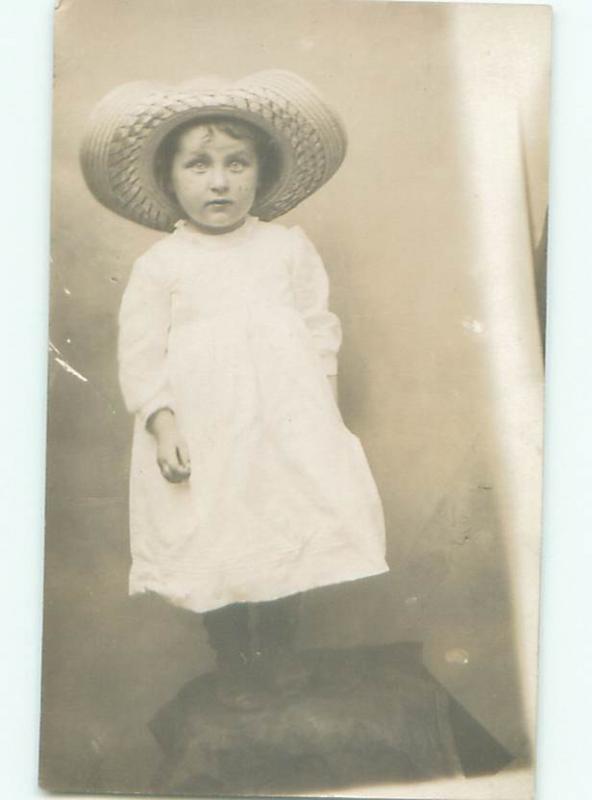 rppc Pre-1920's CHILD WEARING STRAW HAT STARES INTO CAMERA AC7934