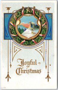 VINTAGE POSTCARD JOYFUL CHRISTMAS GREETINGS CASTLE FLOWING WATER WREATH c. 1910