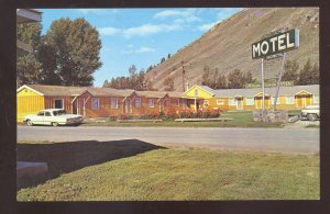 JACKSON HOLE WYOMING STAGE COACH MOTEL VINTAGE ADVERTISING POSTCARD CARS