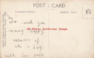 Studio Shot, RPPC, Girl with Flower Sitting on Hassock, James H Jamieson Photo