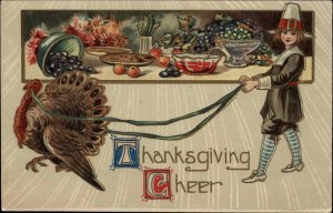 Thanksgiving Cheer Pilgrim Boy with Turkey on Lead c1910 Gel Vintage Postcard