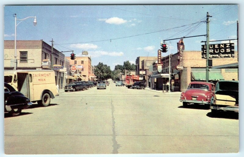 1950s Ogallala NE Downtown Main Street Scene Signs Postcard Milk Rexall Cars A9