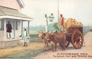 IN PICTURESQUE INDIA BULLOCK CART & TEXACO OILS ADVERTISING POSTCARD (c. 1910)