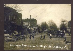 REAL PHOTO ASHLEY OHIO DOWNTOWN STREET SCENE DIRT STORES POSTCARD