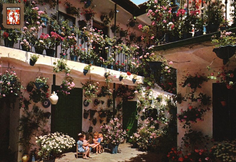 Postcard Courtyard Apartment Building Full Of Flowering Plants Cordova Spain 