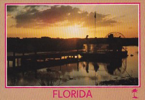 Florida Sunset With Pier and Airboat in the Everglades