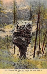 Black men rock 20 feet high Black Hills SD 