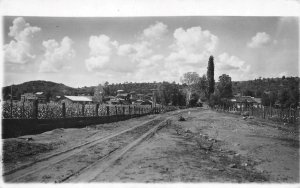 RPPC ~ STREET SCENE Dirt Road~Boardman Bros General Merchandise ca1920s Postcard