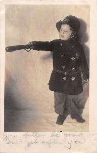 Boy Dressed as Police Officer with Baton Real Photo Vintage Postcard AA44654