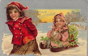 girl red pulling sled of holly sister series 403 Christmas postcard c1911 ac142
