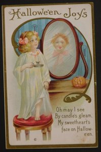 1910s Halloween Postcard Little Girl Casting Spell in Mirror Jack-O'-Lantern