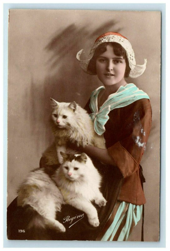 RPPC Woman with Beautiful Cats in a Dutch Style Bonnet Hat Regina Hand Colored