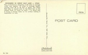 Bonneville News Floating relaxing swimmers Great Salt :Lake Utah Postcard 10404