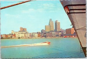 postcard Downtown Toledo from across Maumee River - speedboat skyline freighter