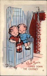 Christmas Boy and Girl Antique Love Seat Waiting for Santa c1910 Postcard