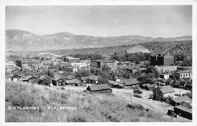 H26/ Ely Nevada RPPC Postcard c40s Overlooking Stores Homes