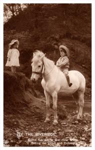 19608  Child boy on horse RPC