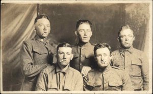 WWI Era Tough Men in Studio Uniforms Smoking Cigarettes Real Photo Postcard