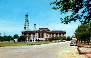 Oklahoma Oklahoma City State Capitol Building With Oil Derricks In The Foregr...