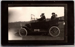 Ford Model T Automobile Family Car Ride Gas Oil RPPC Real Photo Postcard