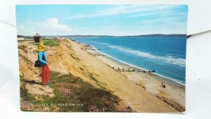 Lady Enjoying Clifftop View Milford on Sea Hampshire Vtg Postcard 1978