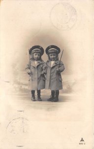 US82 Netherlands children girls  uniform hat and batton rotterdam social history