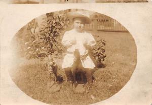 Little boy on rocking horse A116339:A116458Child, People Photo Unused 