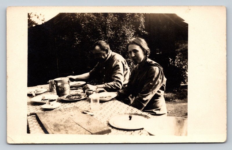 RPPC Man & Woman Eat at the Picnic Table VELOX 1907-1914 ANTIQUE Postcard 1347