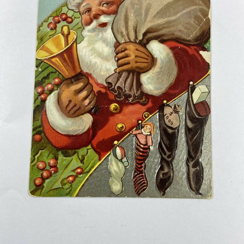 c.1915 Old Santa Claus Bell Toys Sack Bag Stockings Embossed Christmas Postcard