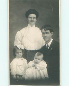 Pre-1918 rppc CUTE GIRL WITH BOW IN HAIR WITH HER FAMILY r5920