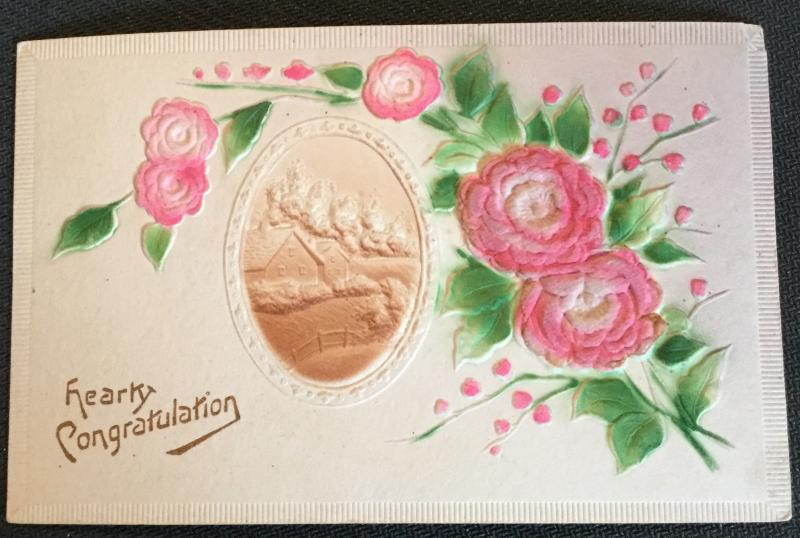 Postcard Unused writing on back “Hearty Congratulation” Flowers Embossed LB