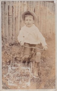 Child On Wobbly Bicycle Antique Real Photo Postcard