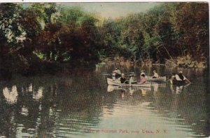 New York Utica Canoeing On Lake At Summit Park